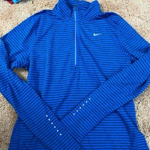Nike blue stripped dri-fit quarter zip.